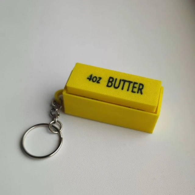 Брелок клавиатура BUTTER. Очень быстро снимает стресс. Сделан на 3D принтере. Из разноц...